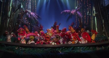 Movie still from “Muppet Treasure Island” (1996), directed by David Lane – A group of stuffed animals sitting on top of a stage; Extreme Wide shot, High angle