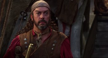 Movie still from “Muppet Treasure Island” (1996), directed by David Lane – A man with a beard wearing a pirate costume; Close Up shot, Over the shoulder angle