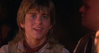 Movie still from “Muppet Treasure Island” (1996), directed by David Lane – A person with long brown hair; Close Up shot, Low angle