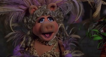 Movie still from “Muppet Treasure Island” (1996), directed by David Lane – A stuffed animal wearing a dress; Close Up shot, High angle