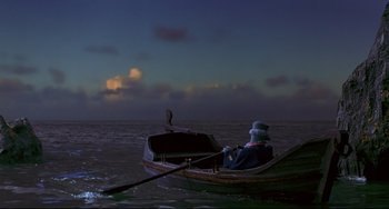 Movie still from “Muppet Treasure Island” (1996), directed by David Lane – A man in a boat in the water; Extreme Wide shot, High angle