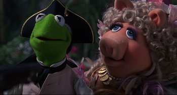Movie still from “Muppet Treasure Island” (1996), directed by David Lane – Kermit the frog and miss; Close Up shot, Low angle