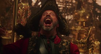 Movie still from “Muppet Treasure Island” (1996), directed by David Lane – A person wearing a pirate hat; Close Up shot, Low angle
