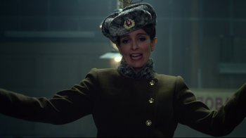 Movie still from “Muppets Most Wanted” (2014), directed by James Bobin – A woman wearing a military uniform and a hat; Close Up shot, Low angle