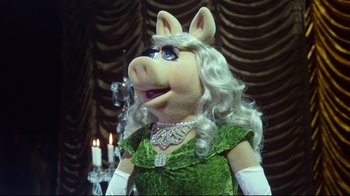 Movie still from “Muppets Most Wanted” (2014), directed by James Bobin – A person dressed as a pig; Close Up shot, High angle