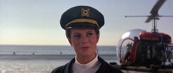 Movie still from “Muscle Beach Party” (1964), directed by William Asher – A person wearing a hat; Close Up shot, Low angle