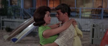 Movie still from “Muscle Beach Party” (1964), directed by William Asher – A man and a woman are dancing together; Medium shot, Low angle