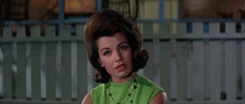 Movie still from “Muscle Beach Party” (1964), directed by William Asher – A person wearing a green shirt; Close Up shot, Low angle