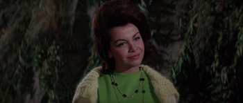 Movie still from “Muscle Beach Party” (1964), directed by William Asher – A person wearing a green shirt; Close Up shot, Low angle