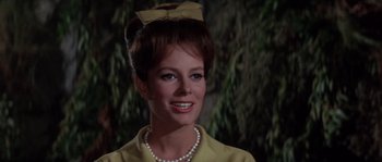 Movie still from “Muscle Beach Party” (1964), directed by William Asher – A person wearing a bow tie; Close Up shot, Low angle