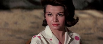 Movie still from “Muscle Beach Party” (1964), directed by William Asher – A person wearing a white shirt; Close Up shot, Low angle