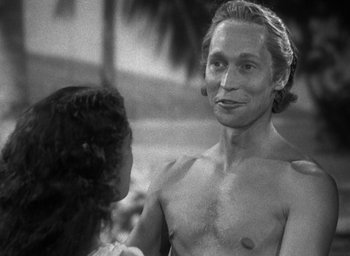 Movie still from “Mutiny on the Bounty” (1935), directed by Frank Lloyd – A black and white photo of a man and a woman; Close Up shot, Over the shoulder angle