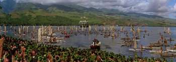 Movie still from “Mutiny on the Bounty” (1962), directed by George Seaton – A group of people on small boats on a body of water; Extreme Wide shot, High angle
