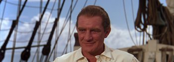 Movie still from “Mutiny on the Bounty” (1962), directed by George Seaton – A person wearing a white shirt; Close Up shot, High angle
