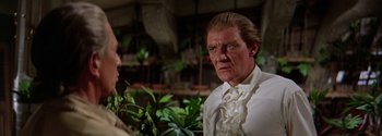 Movie still from “Mutiny on the Bounty” (1962), directed by George Seaton – A person wearing a shirt and tie; Close Up shot, Low angle