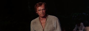 Movie still from “Mutiny on the Bounty” (1962), directed by George Seaton – A person wearing a white shirt; Close Up shot, Low angle