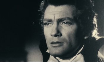 Movie still from “My American Uncle” (1980), directed by Alain Resnais – Black and white photograph of a man in a tuxedo; Close Up shot, High angle