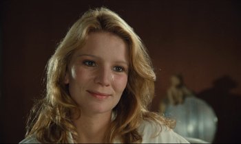 Movie still from “My American Uncle” (1980), directed by Alain Resnais – A person with long blonde hair; Close Up shot, Over the shoulder angle