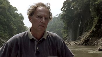 Movie still from “My Best Fiend” (1999), directed by Werner Herzog – A person near a body of water; Close Up shot, Low angle