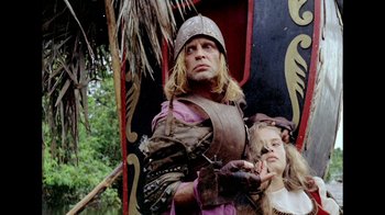 Movie still from “My Best Fiend” (1999), directed by Werner Herzog – A man and a woman dressed in medieval garb; Medium shot, Low angle