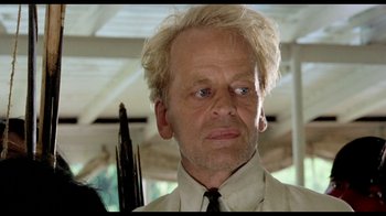 Movie still from “My Best Fiend” (1999), directed by Werner Herzog – A person holding a umbrella; Close Up shot, Low angle