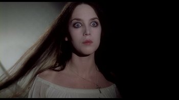 Movie still from “My Best Fiend” (1999), directed by Werner Herzog – A woman with long dark hair wearing a white dress; Close Up shot, Low angle