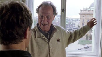 Movie still from “My Best Fiend” (1999), directed by Werner Herzog – An older man talking to a young boy; Close Up shot, Over the shoulder angle