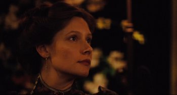 Movie still from “My Brilliant Career” (1979), directed by Gillian Armstrong – A person looking to her left; Close Up shot, Low angle