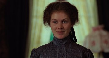 Movie still from “My Brilliant Career” (1979), directed by Gillian Armstrong – A young woman with a long curly red hair and blue eyes; Close Up shot, Low angle