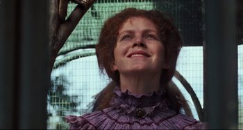 Movie still from “My Brilliant Career” (1979), directed by Gillian Armstrong – A person wearing a purple dress; Close Up shot, Low angle