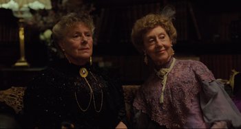 Movie still from “My Brilliant Career” (1979), directed by Gillian Armstrong – Two older women standing next to each other; Close Up shot, High angle