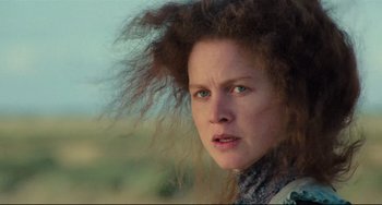 Movie still from “My Brilliant Career” (1979), directed by Gillian Armstrong – A person with a messy hair style; Close Up shot, Low angle