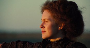 Movie still from “My Brilliant Career” (1979), directed by Gillian Armstrong – A person with curly red hair; Close Up shot, Low angle
