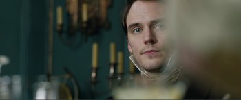 Movie still from “My Cousin Rachel” (2017), directed by Roger Michell – A person wearing a white shirt; Close Up shot, Over the shoulder angle