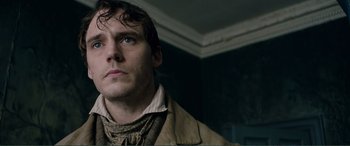 Movie still from “My Cousin Rachel” (2017), directed by Roger Michell – A person wearing a jacket; Close Up shot, Low angle