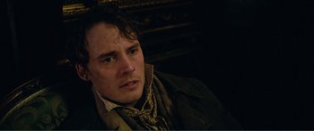 Movie still from “My Cousin Rachel” (2017), directed by Roger Michell – A person wearing a jacket; Close Up shot, High angle