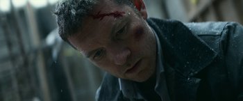 Movie still from “Fractured” (2019), directed by Brad Anderson – A person with a head injury; Close Up shot, Low angle