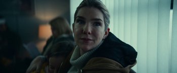 Movie still from “Fractured” (2019), directed by Brad Anderson – A person wearing a jacket; Close Up shot, Over the shoulder angle