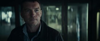 Movie still from “Fractured” (2019), directed by Brad Anderson – A person wearing a black jacket; Close Up shot, Over the shoulder angle