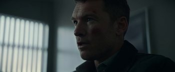 Movie still from “Fractured” (2019), directed by Brad Anderson – A person looking at the camera; Close Up shot, Over the shoulder angle