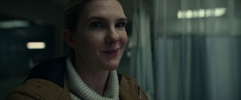 Movie still from “Fractured” (2019), directed by Brad Anderson – A person wearing a jacket; Close Up shot, Over the shoulder angle