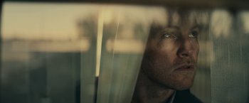 Movie still from “Fractured” (2019), directed by Brad Anderson – A person looking out a window; Extreme Close Up shot, Low angle
