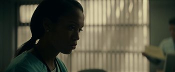 Movie still from “Fractured” (2019), directed by Brad Anderson – A person looking to the side; Close Up shot, Over the shoulder angle