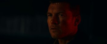 Movie still from “Fractured” (2019), directed by Brad Anderson – A person looking at the camera; Close Up shot, Low angle