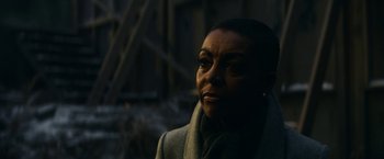 Movie still from “Fractured” (2019), directed by Brad Anderson – A person wearing a coat; Close Up shot, Over the shoulder angle