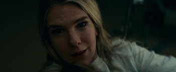 Movie still from “Fractured” (2019), directed by Brad Anderson – A woman's face in the dark; Close Up shot, Overhead angle
