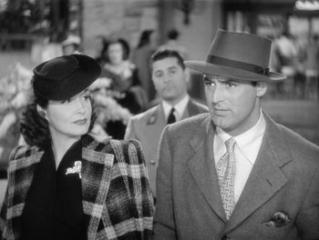 Movie still from “My Favorite Wife” (1940), directed by Garson Kanin – A black and white photo of a man and a woman; Medium shot, Low angle