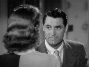 Movie still from “My Favorite Wife” (1940), directed by Garson Kanin – A black and white photo of a man and a woman; Close Up shot, Over the shoulder angle