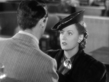 Movie still from “My Favorite Wife” (1940), directed by Garson Kanin – A man and a woman talking to each other; Close Up shot, Over the shoulder angle