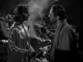 Movie still from “My Man Godfrey” (1936), directed by Gregory La Cava – A man and a woman standing next to each other; Medium shot, Over the shoulder angle